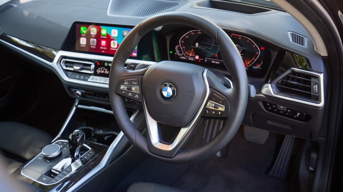 2021 Audi A4 v 2021 BMW 330i comparison-1