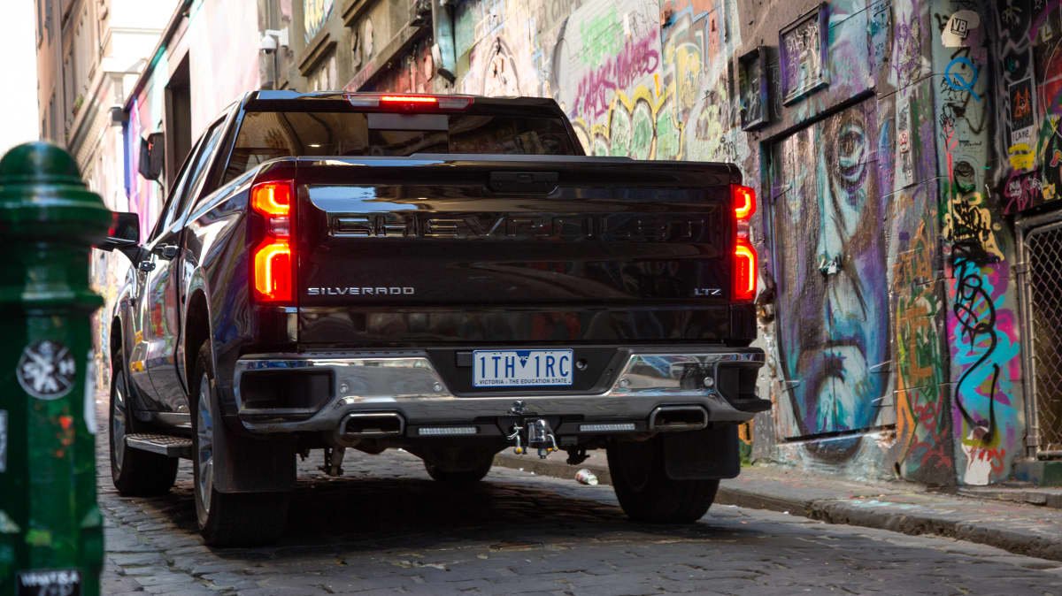 2021 Chevrolet Silverado 1500 LTZ Premium v 2022 Ram 2500 Laramie comparison-0