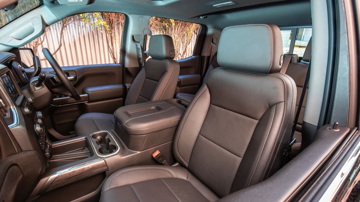 2021 Chevrolet Silverado 1500 LTZ Premium v 2022 Ram 2500 Laramie comparison-1