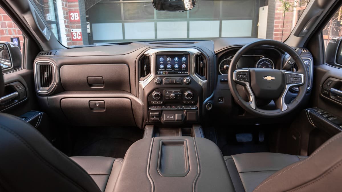 2021 Chevrolet Silverado 1500 LTZ Premium v 2022 Ram 2500 Laramie comparison-0