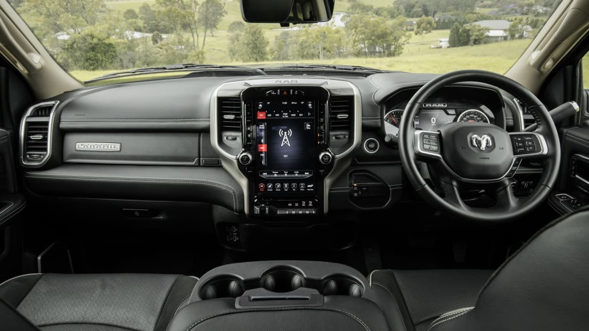 2021 Chevrolet Silverado 1500 LTZ Premium v 2022 Ram 2500 Laramie comparison-0