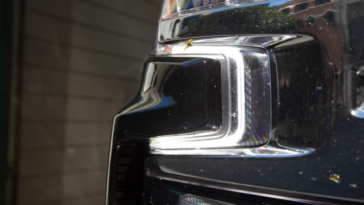 2021 Chevrolet Silverado 1500 LTZ Premium v 2022 Ram 2500 Laramie comparison-0