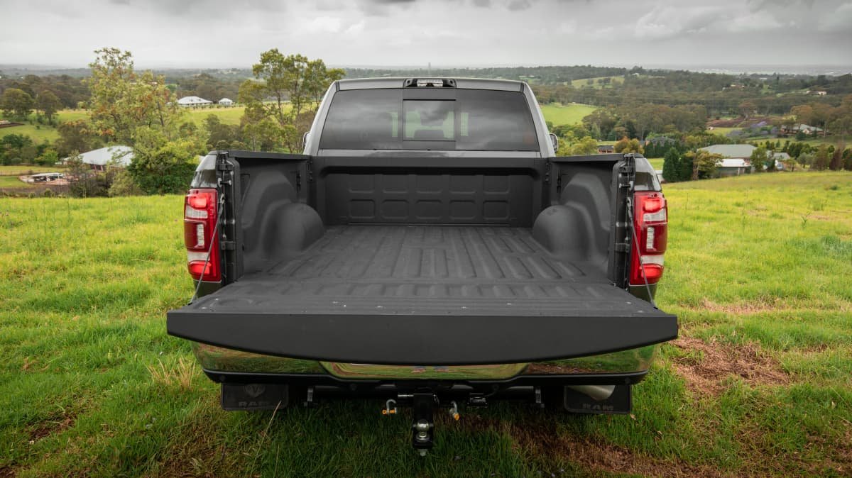 2021 Chevrolet Silverado 1500 LTZ Premium v 2022 Ram 2500 Laramie comparison-0