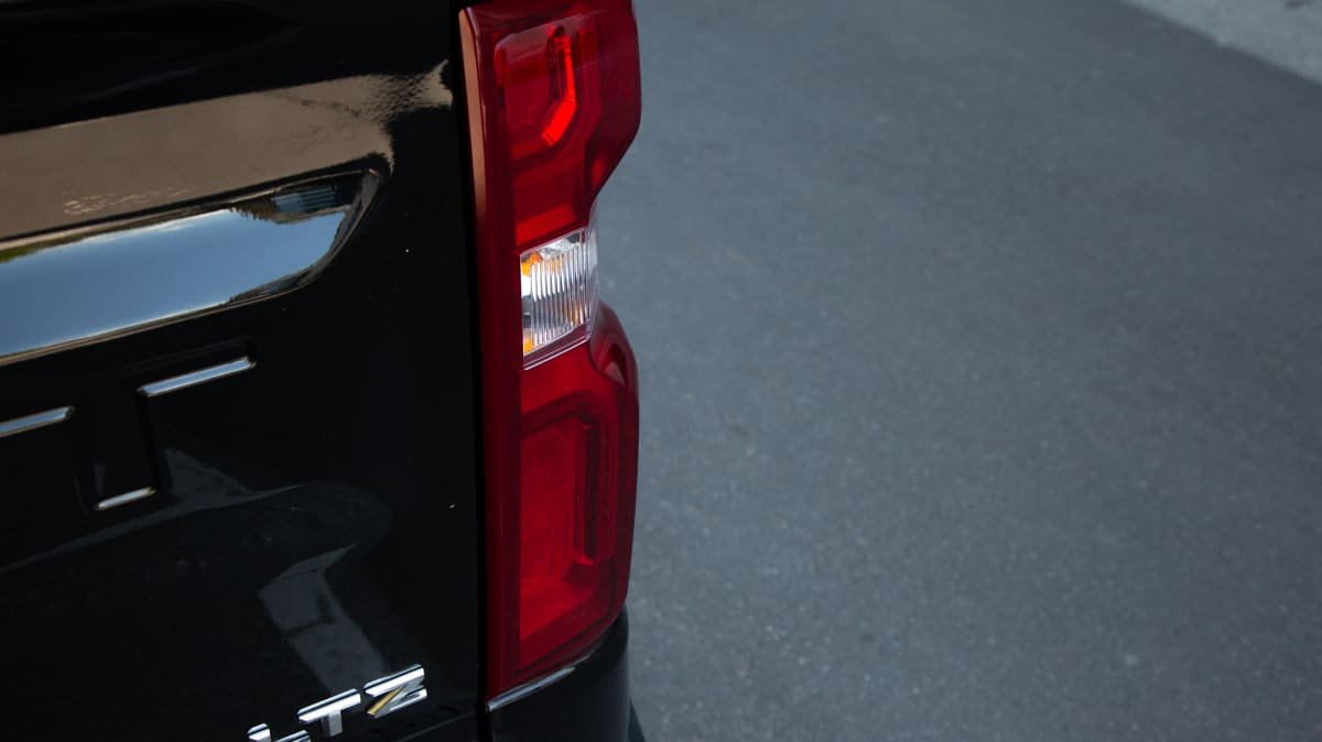 2021 Chevrolet Silverado 1500 LTZ Premium v 2022 Ram 2500 Laramie comparison-1