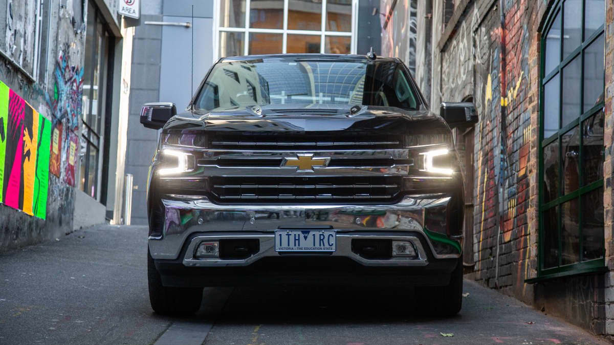 2021 Chevrolet Silverado 1500 LTZ Premium v 2022 Ram 2500 Laramie comparison-0