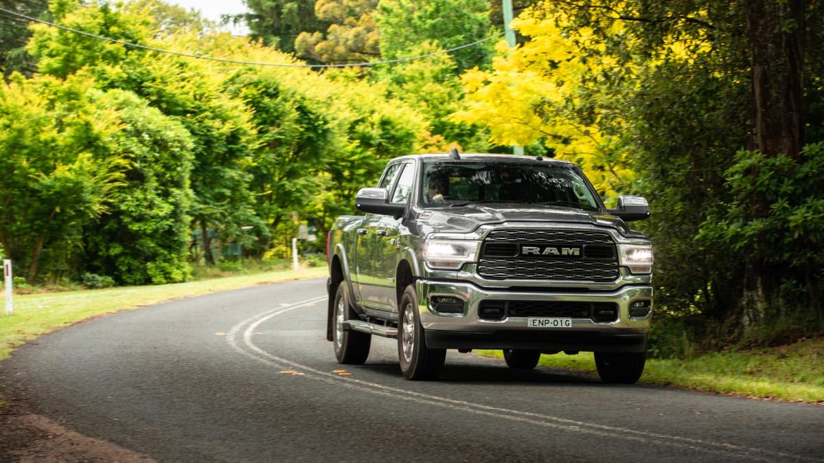 2021 Chevrolet Silverado 1500 LTZ Premium v 2022 Ram 2500 Laramie comparison-0