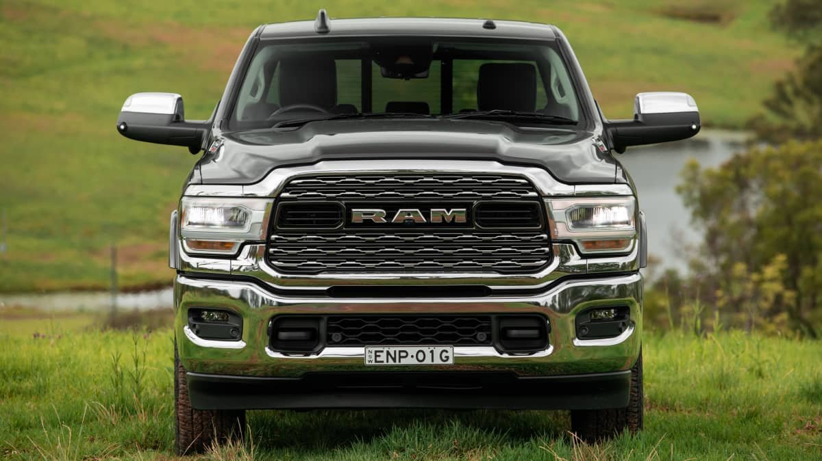 2021 Chevrolet Silverado 1500 LTZ Premium v 2022 Ram 2500 Laramie comparison-0