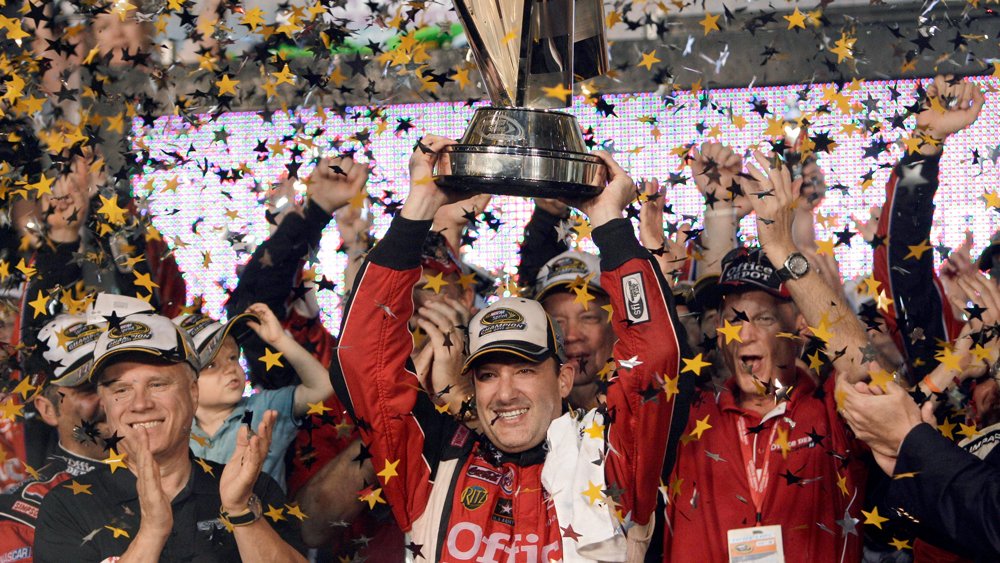 Tony Stewart winning the NASCAR Sprint Cup Series Championship in 2011.