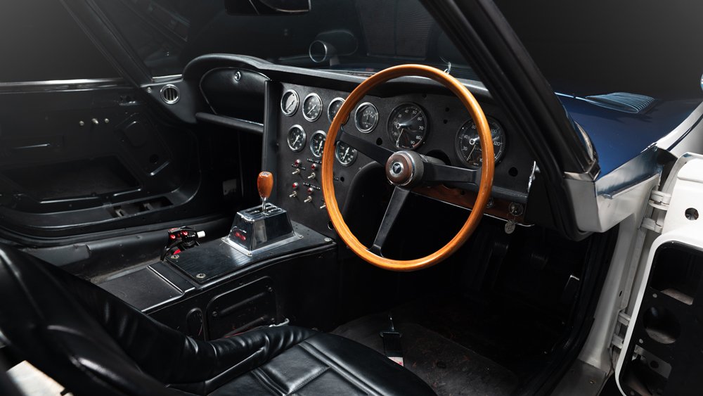 The interior of a 1967 Toyota-Shelby 2000 GT.
