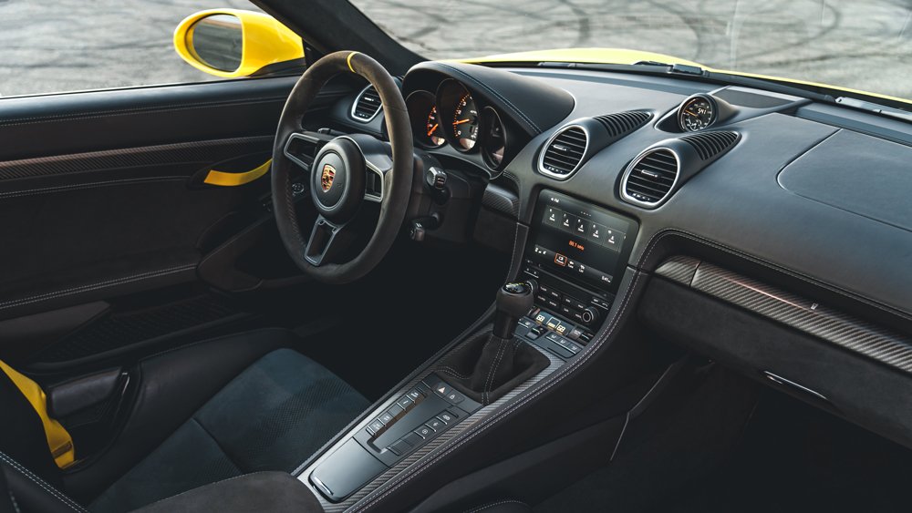 The interior of a 2022 Porsche 718 Cayman GT4 RS.