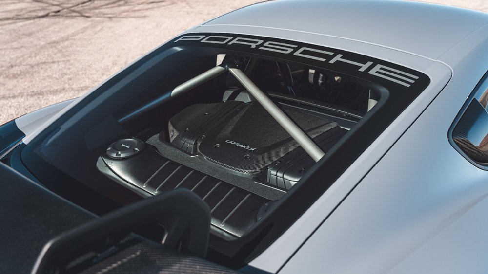 A view of the 493 hp, 4.0-liter flat-six engine inside a 2022 Porsche 718 Cayman GT4 RS equipped with the Weissach Package.