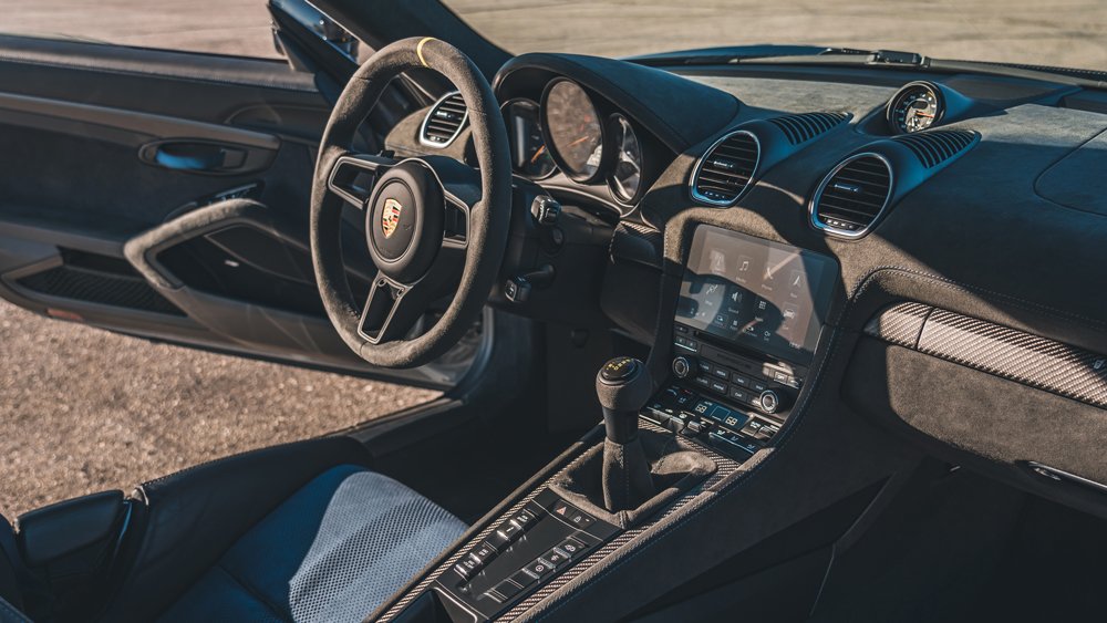 The interior of a 2022 Porsche 718 Cayman GT4 RS equipped with the Weissach Package.