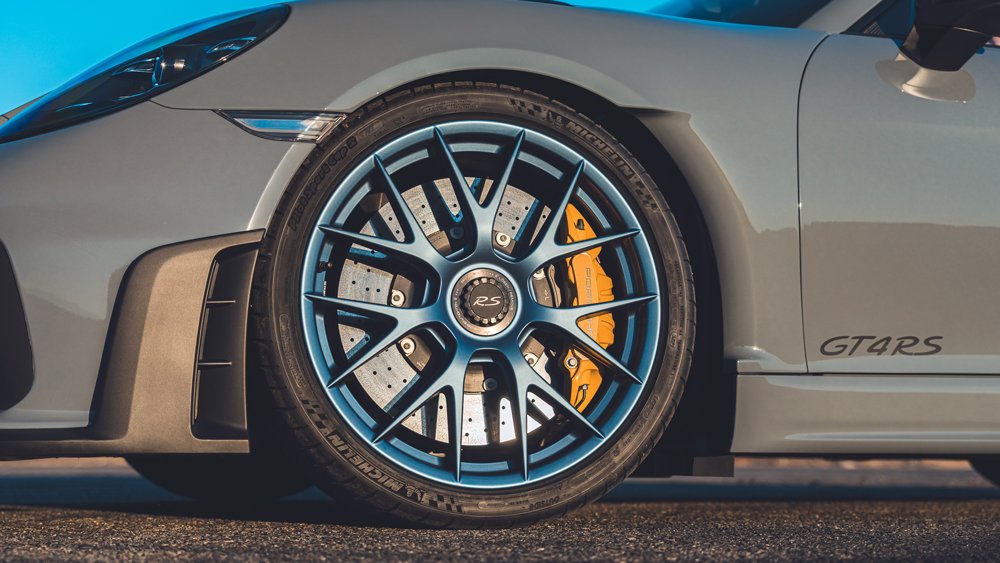 A close-up of the magnesium wheels on a 2022 Porsche 718 Cayman GT4 RS equipped with the Weissach Package.