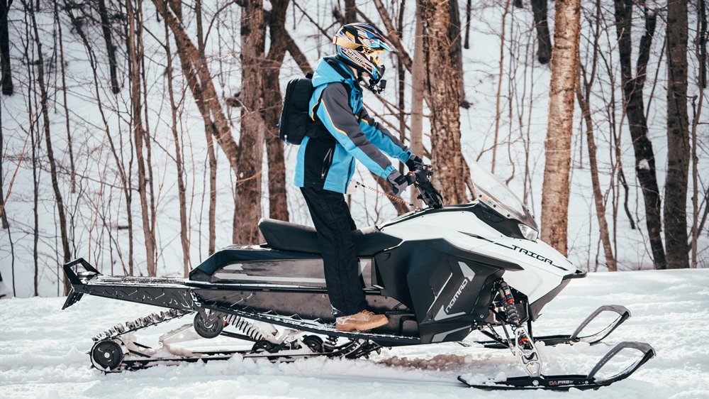 Riding the all-electric Taiga Nomad snowmobile outside of Stowe, Vt.