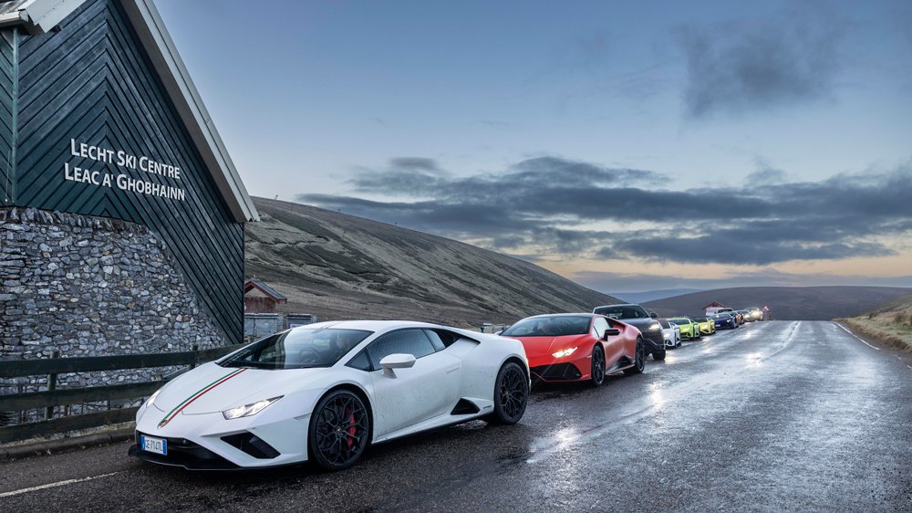 A convoy of Lamborghinis during a road trip through the Scottish Highlands.