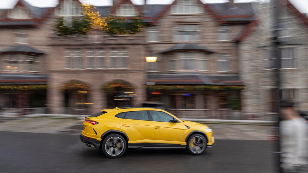 A Lamborghini Urus SUV being driven in Scotland.