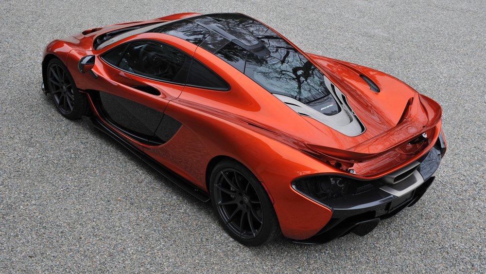 A 2015 McLaren P1 supercar in Volcano Orange.
