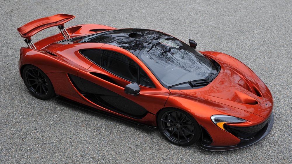 A 2015 McLaren P1 supercar in Volcano Orange.