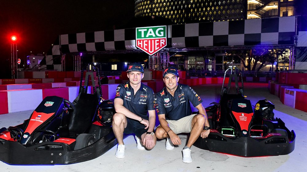 Red Bull Racing's Max Verstappen and Sergio Perez at TAG Heuer's go-kart experience in the Miami Design District's Jungle Plaza during the 2022 Formula 1 Miami Grand Prix weekend.