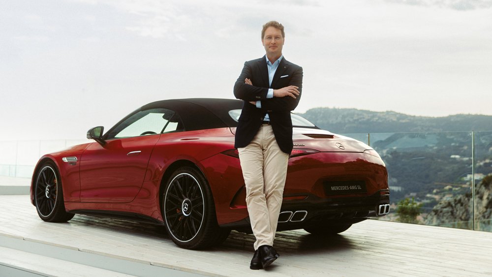 Ola Källenius, CEO of Mercedes-Benz, stands with a new Mercedes-AMG SL in Monaco.