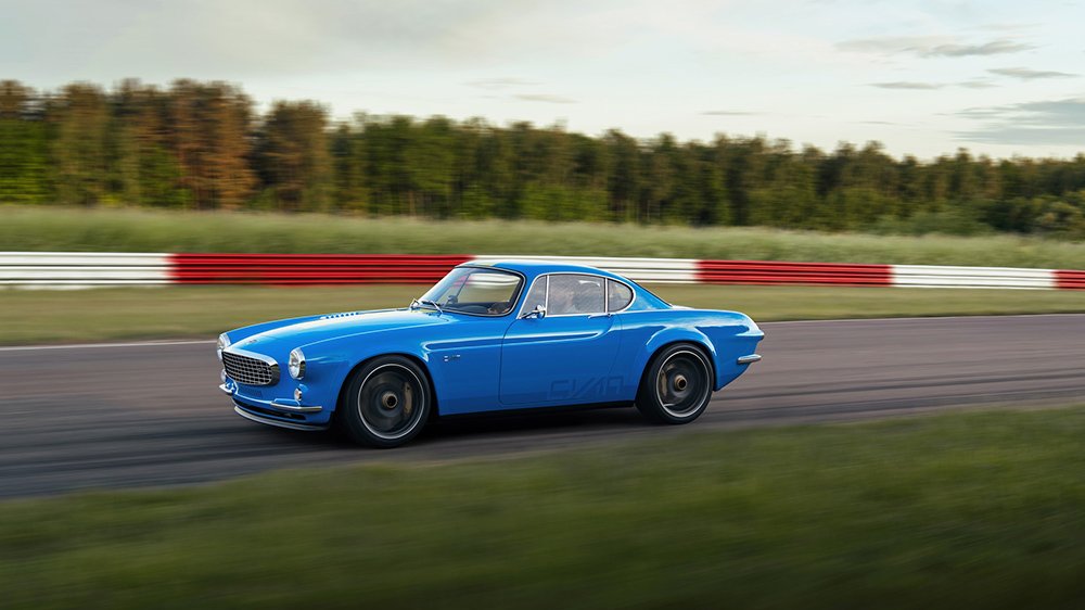 The Volvo P1800 Cyan on a race track