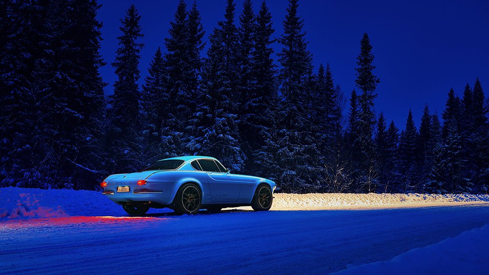 The Volvo P1800 Cyan at night