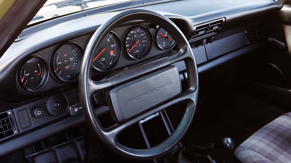 The interior of a rare 1989 Porsche 911 Carrera 3.2 Club Sport.