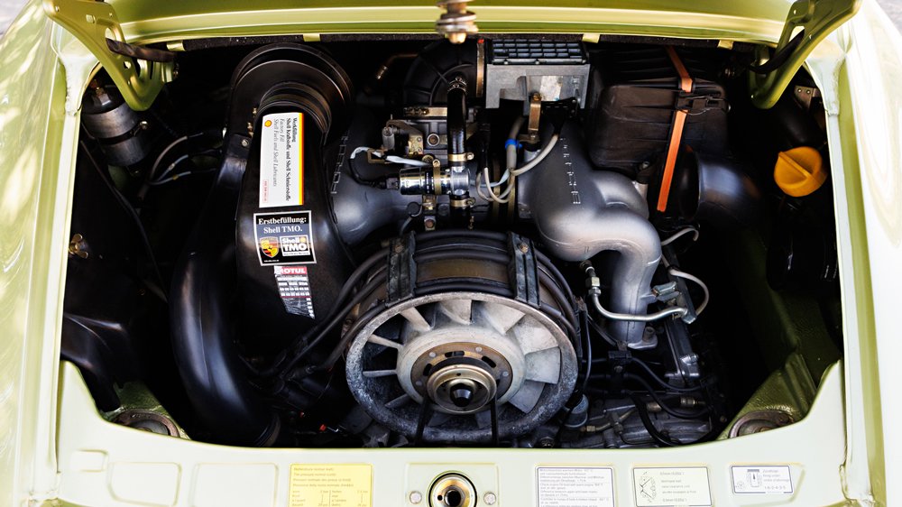 The 3.2-liter flat-six engine inside a rare 1989 Porsche 911 Carrera 3.2 Club Sport in Linden Green.