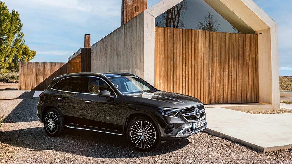 The Inside the 2023 Mercedes-Benz GLC300 parked in front of a house