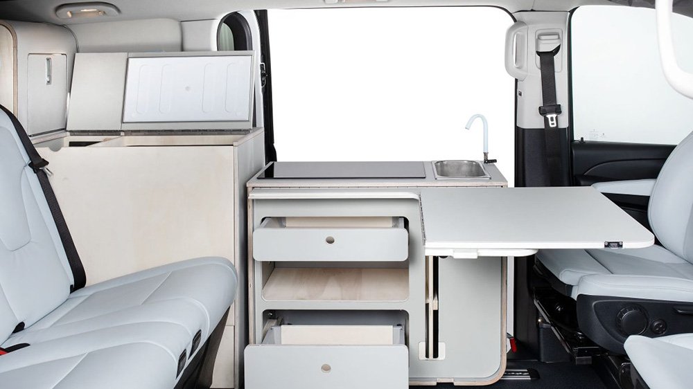 The Tonke Mercedes-Benz EQV Touring's living and cooking area