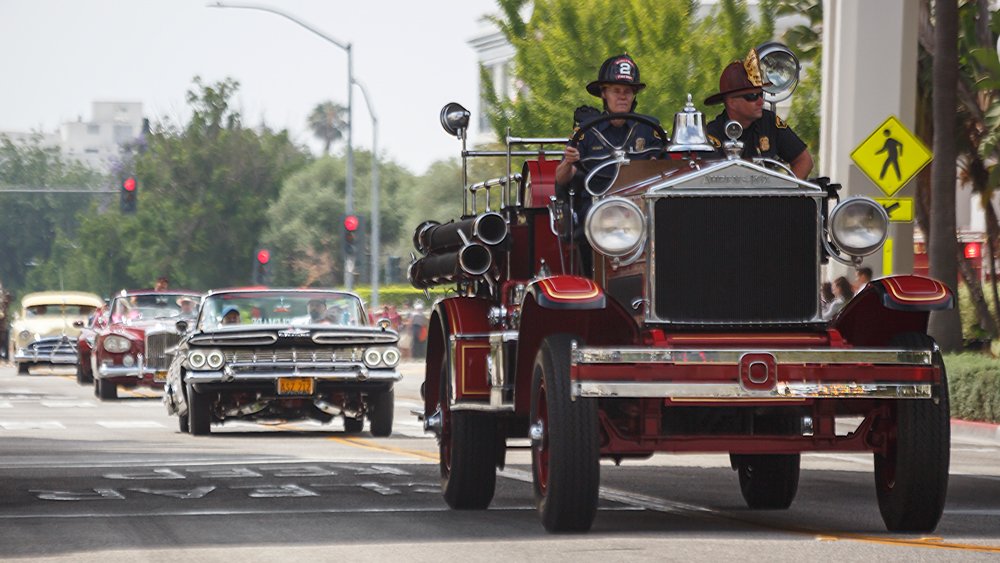 A restored Ahrens-Fox fire truck takes part in the Rodeo Drive Tour d'Elegance.