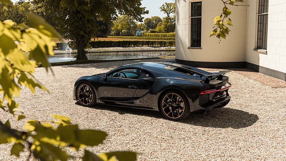 A rear 3/4 view of the Bugatti Chiron L'Ebe