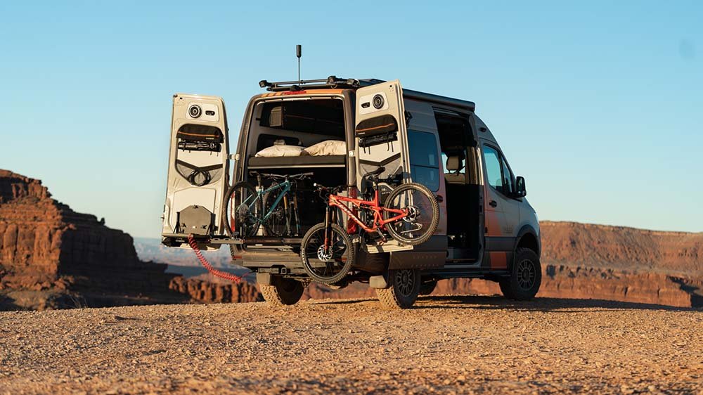 The Outside Van Tails with its rear doors open