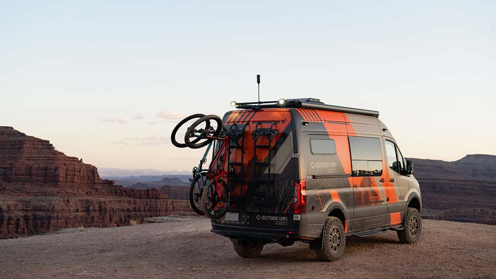 The Outside Van Tails with a bike mounted on it