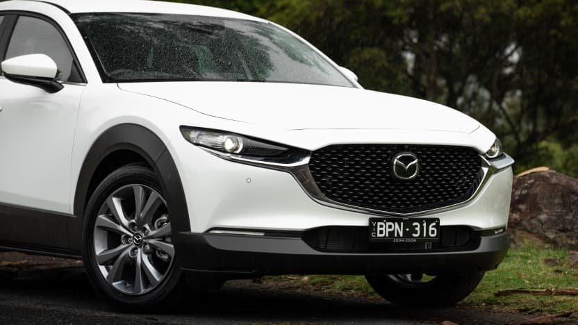 2022 Mazda CX-30 G20e Evolve Hybrid v 2022 Toyota C-HR GR Sport hybrid comparison-0