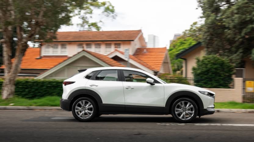 2022 Mazda CX-30 G20e Evolve Hybrid v 2022 Toyota C-HR GR Sport hybrid comparison-0
