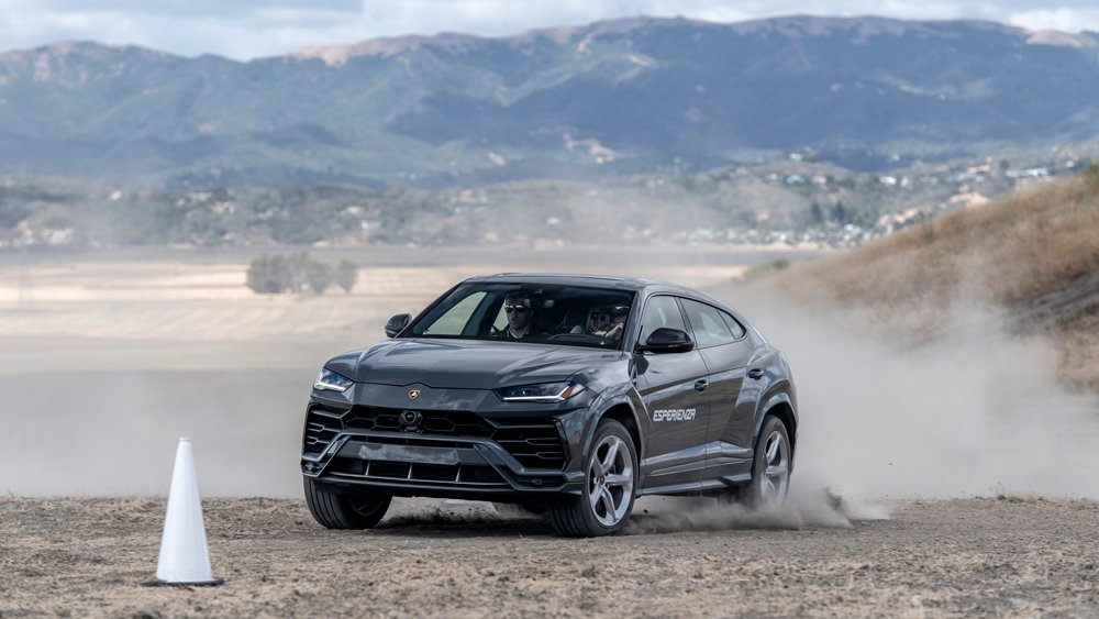 The 641 hp Lamborghini Urus being driven off-road.
