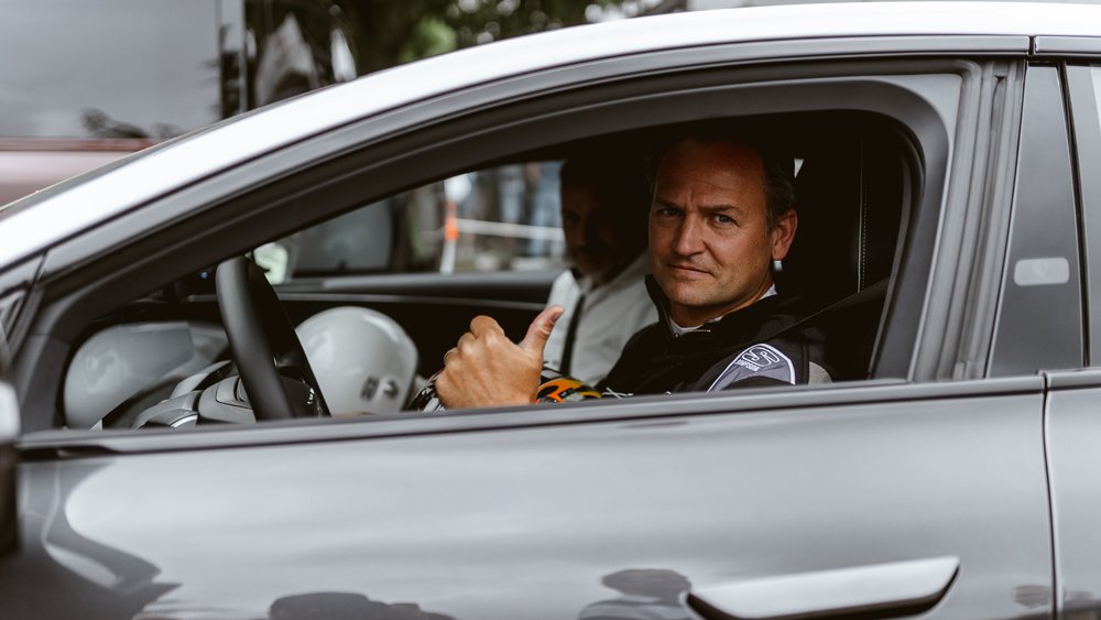 Race driver Ben Collins in the all-electric Lucid Air Grand Touring Performance sedan.