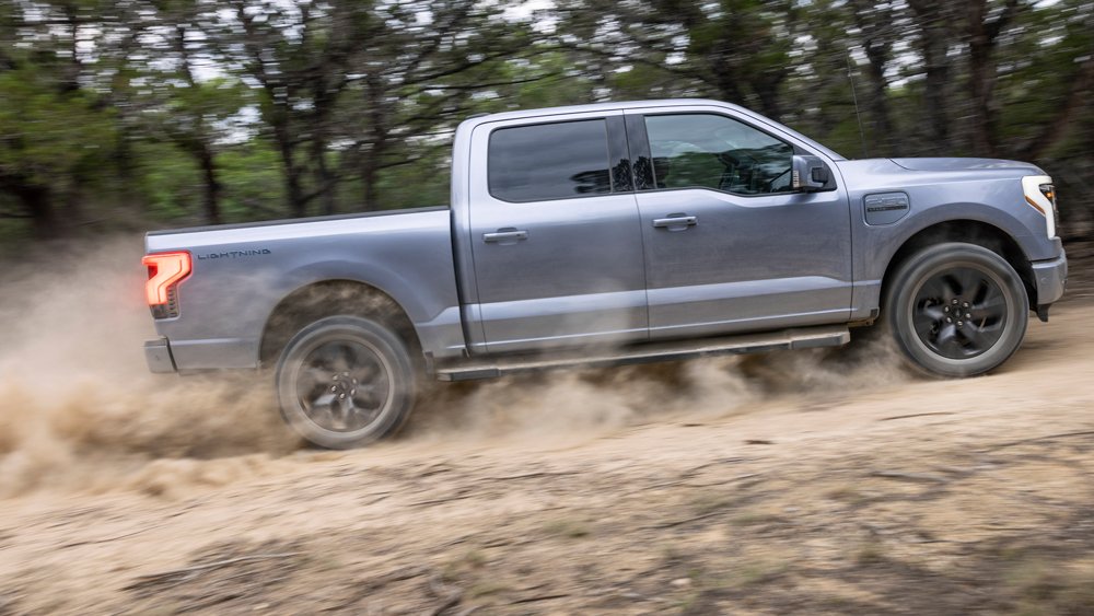 A Ford F-150 Lightning does some off-road exploration.