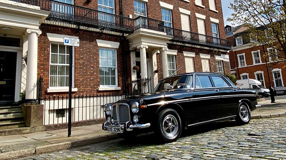 The 1973 Rover P5 parked on a street in England