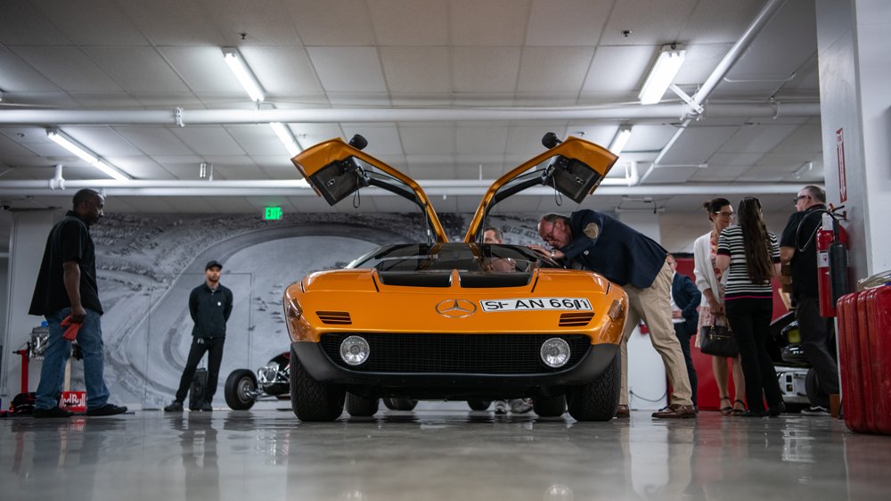 At the Mercedes-Benz Classic Center in Long Beach, Calif., Marcus Breitschwerdt (right), executive vice president of Mercedes-Benz AG and head of Mercedes-Benz Classic, leans in to inspect the C111's cockpit.