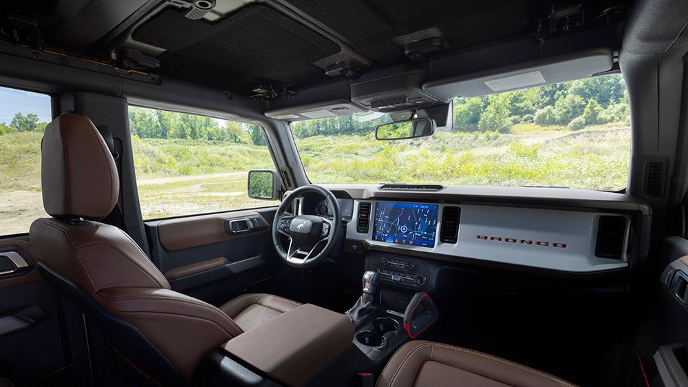Bronco Heritage Limited Edition available winter 2023. Limited availability. Preproduction models shown. Always consult the Owner’s Manual before off-road driving, know your terrain and trail difficulty, and use appropriate safety gear.