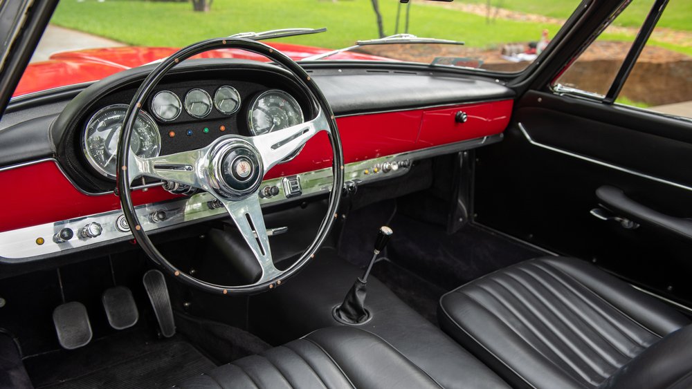 The interior of a 1960 Maserati 3500 GT Spyder.