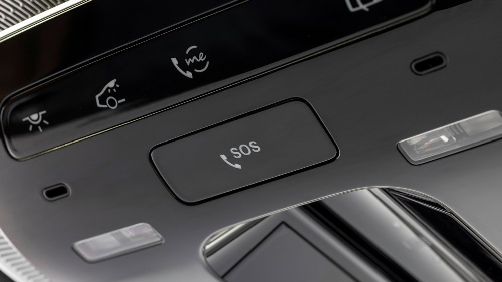 An emergency communication feature inside an electric vehicle from Mercedes-Benz.