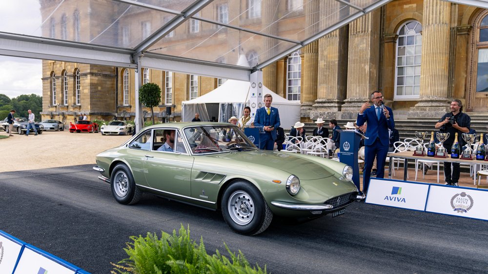 A restored 1966 Ferrari 330 GTC being honored with a class win at the 2022 Salon Privé Concours d’Elégance.