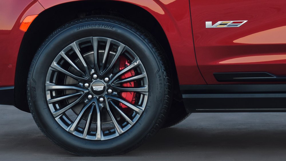 A close-up of a front wheel on the 2023 Cadillac Escalade-V.
