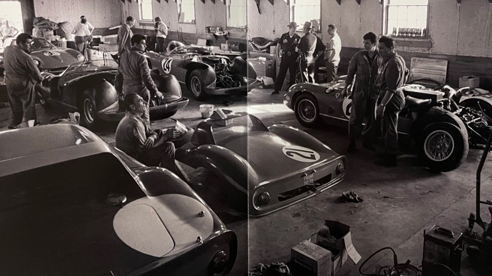 A photo of Ferrari factory team cars receiving last-minute attention at the 12 Hours of Sebring in 1964, from the book 