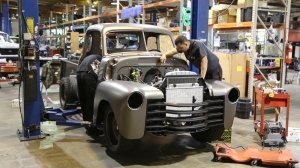 A craftsman works on a Chevrolet Thriftmaster custom at Icon's base of operations.