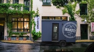 The Nook Tiny Homes Roam travel trailer can be used as a mobile office or storefront