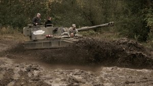 Operating a tank at Drive a Tank in Kasota, Minn.